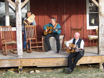 musicians performing on a front porch