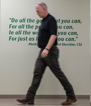 jason wesco walking in front of quote