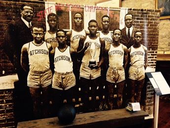 banner featuring African American basketball team in mid-1900s