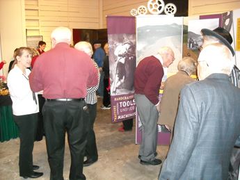 People visiting museum exhibition