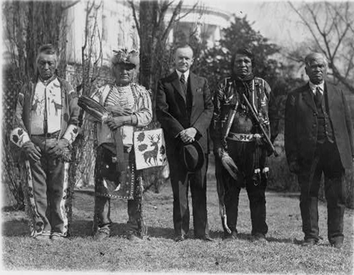 President Coolidge and Native American leaders at White House