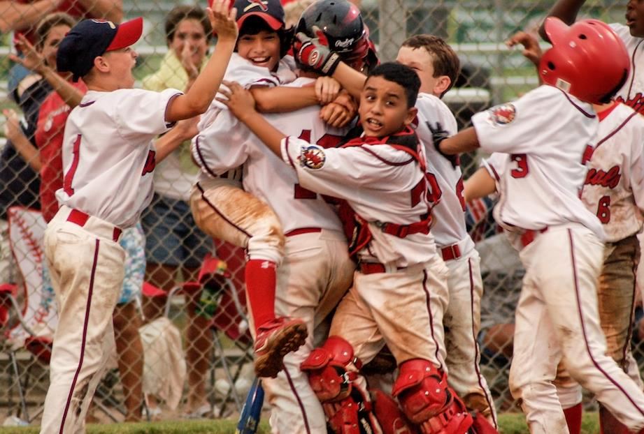 Youth baseball team celebrating win