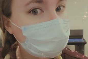 young woman wearing mask