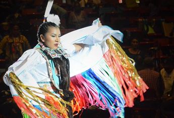 woman dancing at a powwow