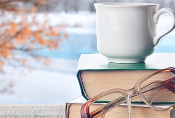 mug on stack of books