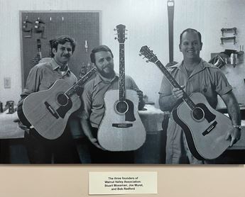 three men with guitars