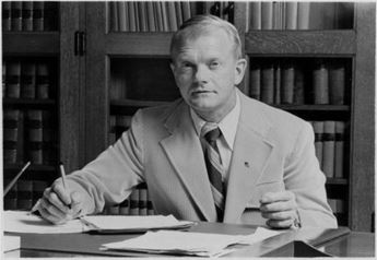 man seated at desk