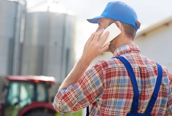 Farmer talking on phone