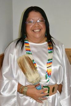 Woman in traditional Cheyenne dress