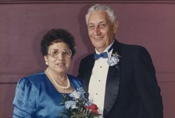 photo of woman and man dressed in formal attire