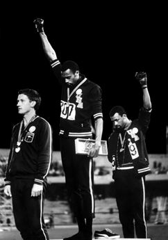men standing at Olympic podium