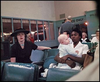 woman and child at an airport terminal