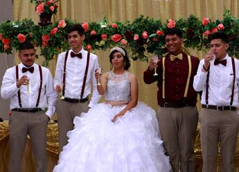 Young people raise their glass in toast