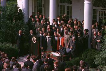 President Lyndon B Johnson signing legislation