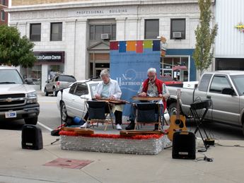 man and woman playing musical instruments