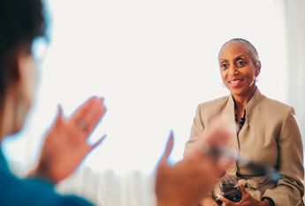 Two women talking