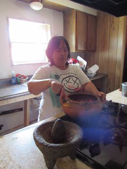 Woman cooking in kitchen