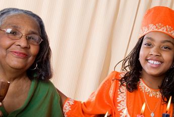 woman and girl celebrating kwanzaa