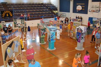 museum exhibition set up on basketball court