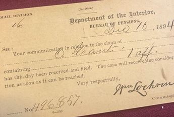 Photo of historical pension document from 1894