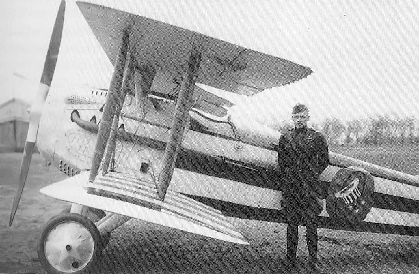 Major Reed Chambers, AEF 94th Pursuit Squadron, pictured in front of a plane in France, 1918.