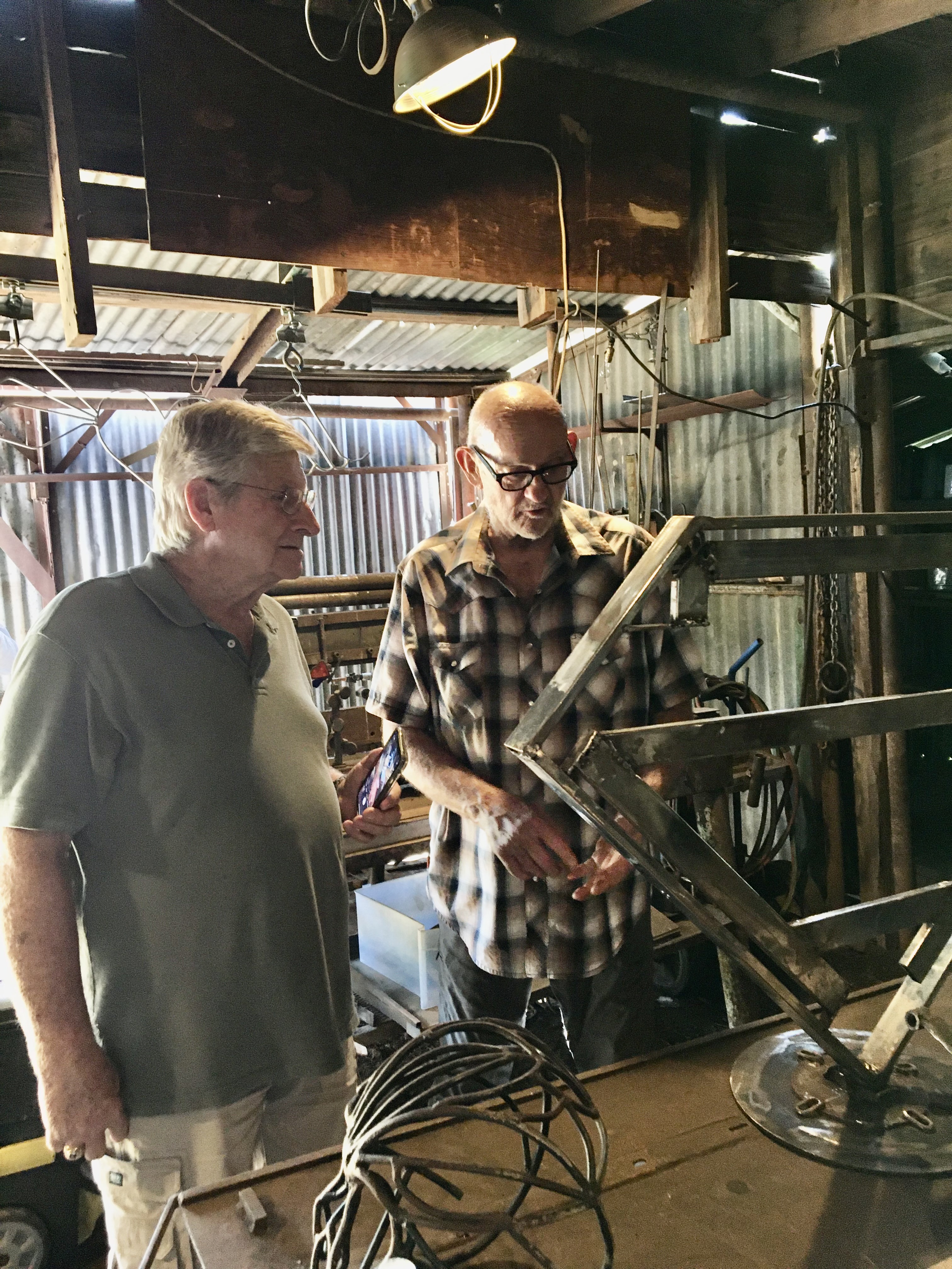 Bob Mix (right) is a sculpture artist from Great Bend.